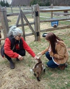 Jenn and Adrienne with baby goat